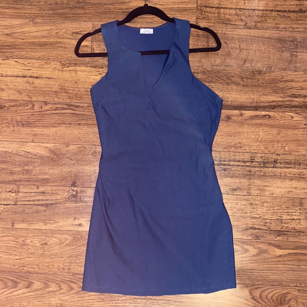 Blue body con dress, slit front and back cut out